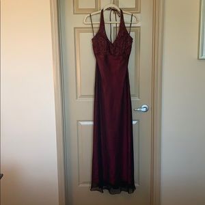 Wine/maroon colored formal dress.